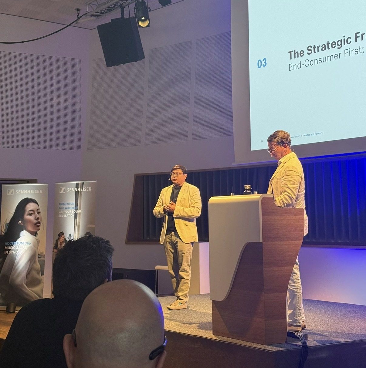Sean Rezel presenting the global e-commerce roadmap on stage at an internal global conference